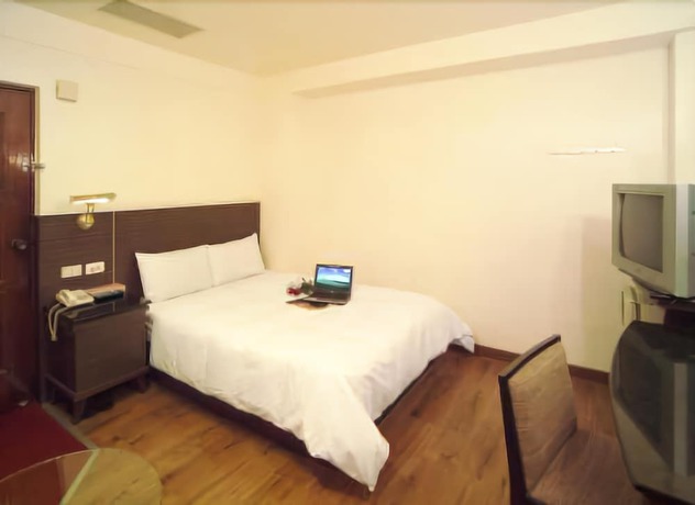 Imagen de la habitación del Hotel Hua Tai. Foto 8