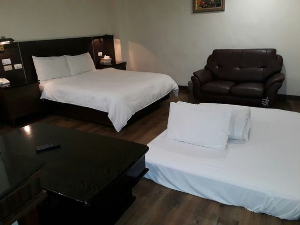 Imagen de la habitación del Hotel Hua Tai. Foto 9