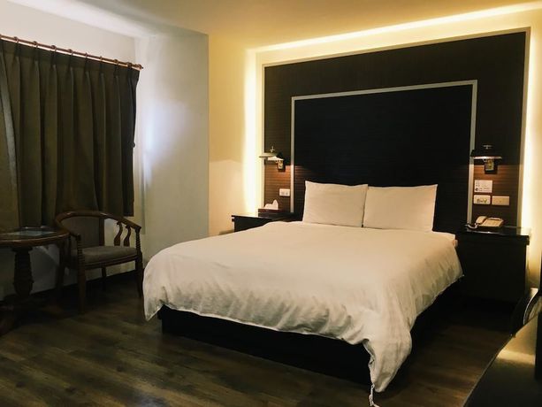 Imagen de la habitación del Hotel Hua Tai. Foto 10