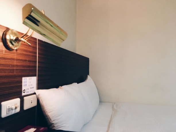 Imagen de la habitación del Hotel Hua Tai. Foto 11