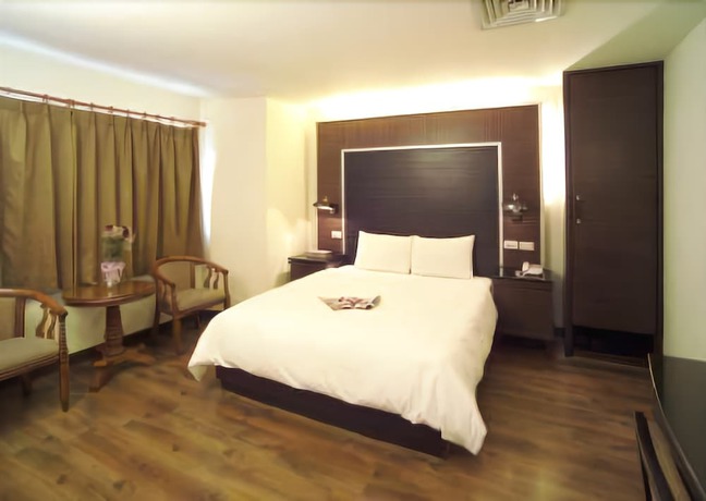 Imagen de la habitación del Hotel Hua Tai. Foto 13
