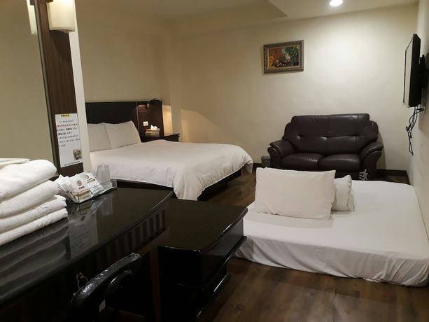Imagen de la habitación del Hotel Hua Tai. Foto 14