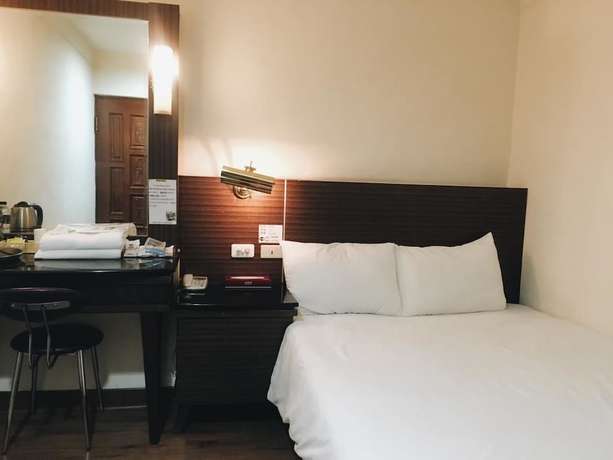 Imagen de la habitación del Hotel Hua Tai. Foto 15