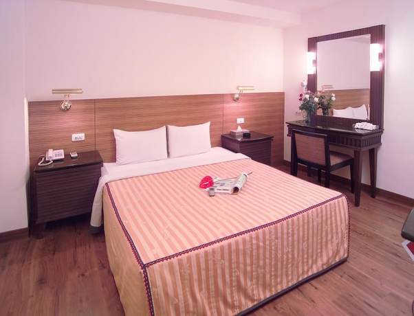 Imagen de la habitación del Hotel Hua Tai. Foto 16