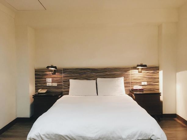 Imagen de la habitación del Hotel Hua Tai. Foto 17