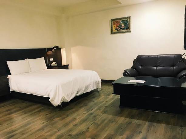Imagen de la habitación del Hotel Hua Tai. Foto 18