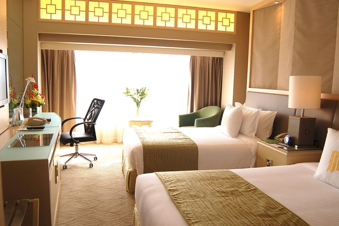 Imagen de la habitación del Hotel Hua Ting and Towers. Foto 8