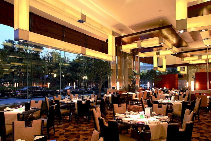 Imagen del bar/restaurante del Hotel Hua Ting and Towers. Foto 4