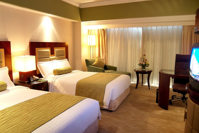 Imagen de la habitación del Hotel Hua Ting and Towers. Foto 14