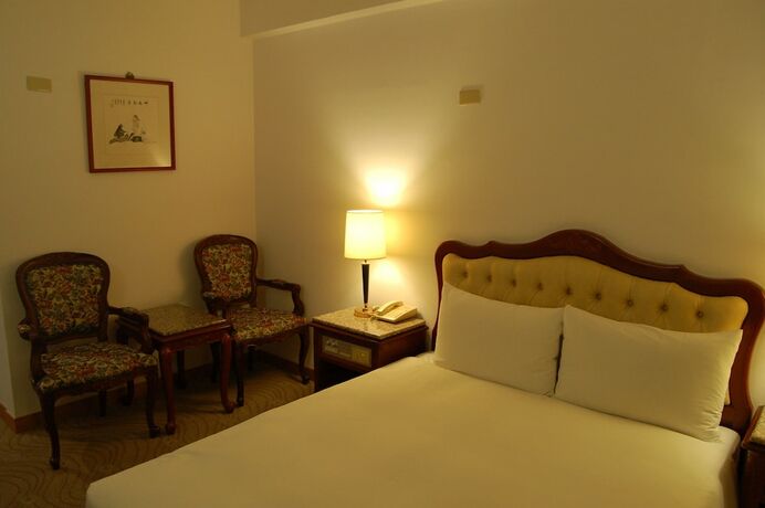 Imagen de la habitación del Hotel Hua Tong. Foto 14