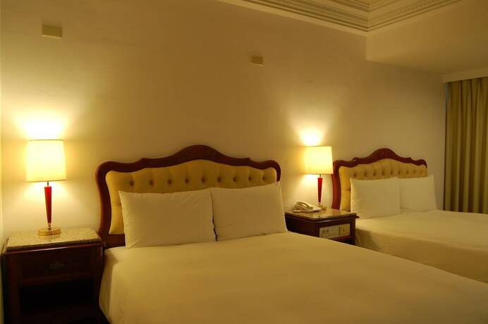 Imagen de la habitación del Hotel Hua Tong. Foto 17