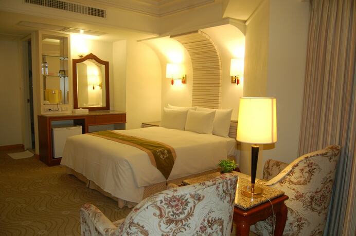 Imagen de la habitación del Hotel Hua Tong. Foto 19