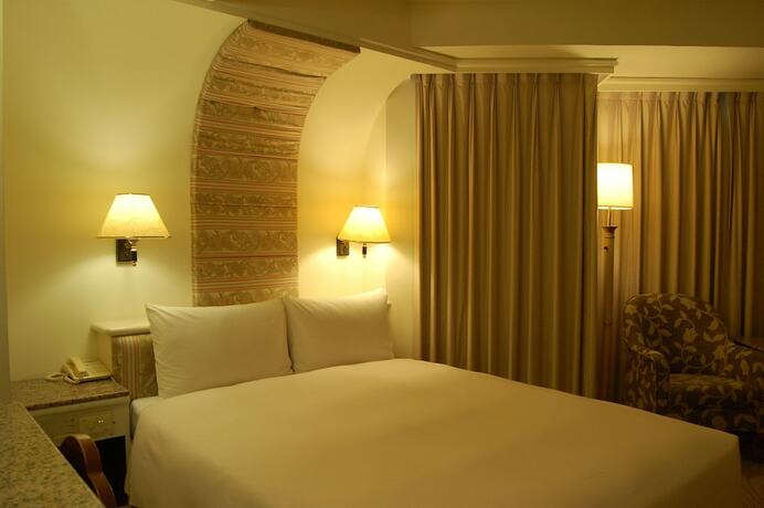 Imagen de la habitación del Hotel Hua Tong. Foto 21
