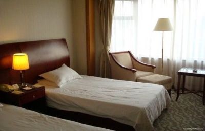 Imagen de la habitación del Hotel Hua Xia Hotel. Foto 5