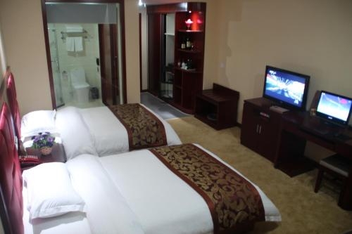 Imagen de la habitación del Hotel Hua Xin International. Foto 6