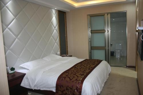 Imagen de la habitación del Hotel Hua Xin International. Foto 8