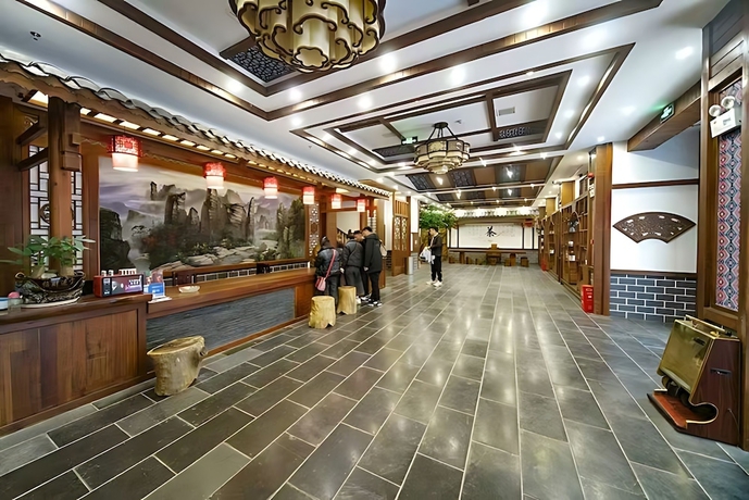 Imagen de los interiores del Hotel HuaHarmony Wulingyuan City Inn. Foto 13