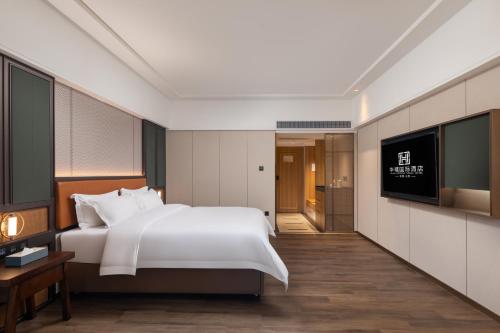 Imagen general del Hotel HuaXi International. Foto 4