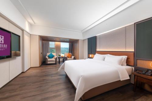 Imagen general del Hotel HuaXi International. Foto 6