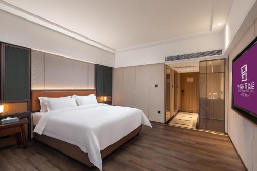 Imagen general del Hotel HuaXi International. Foto 7