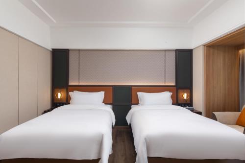 Imagen general del Hotel HuaXi International. Foto 10