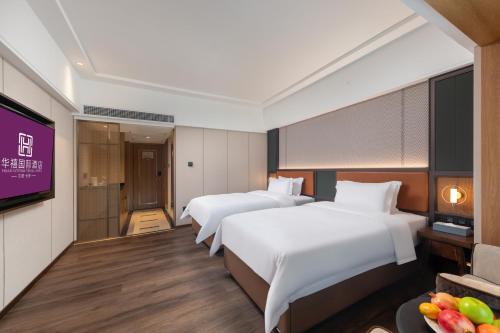 Imagen general del Hotel HuaXi International. Foto 13