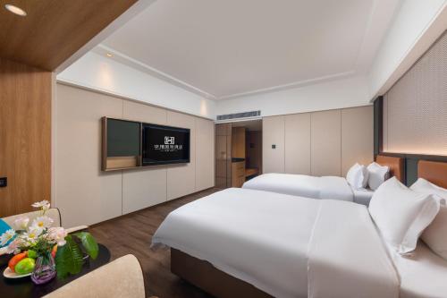 Imagen general del Hotel HuaXi International. Foto 14