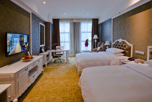 Imagen de la habitación del Hotel Huachen International. Foto 2