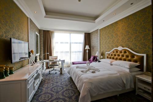 Imagen de la habitación del Hotel Huachen International. Foto 3