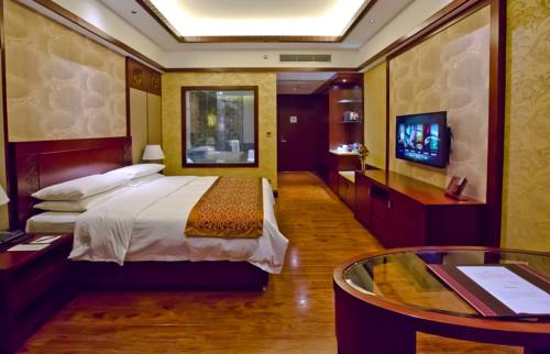 Imagen de la habitación del Hotel Huachen International. Foto 4