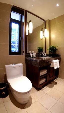 Imagen de la habitación del Hotel Huadi Resort. Foto 13