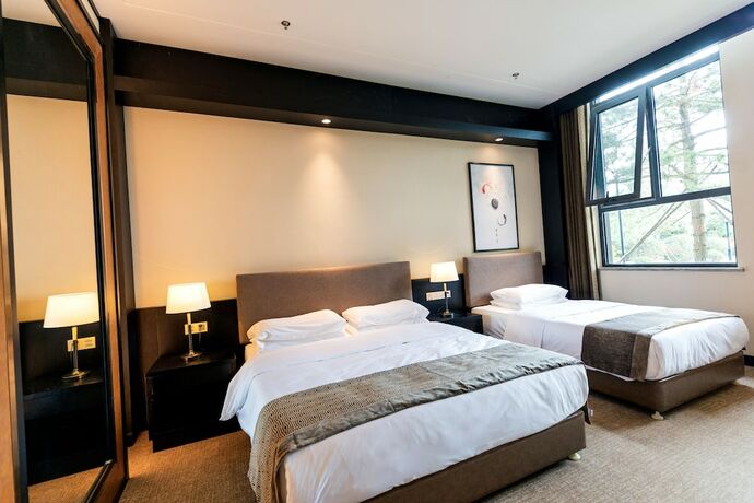 Imagen de la habitación del Hotel Huadi Resort. Foto 15