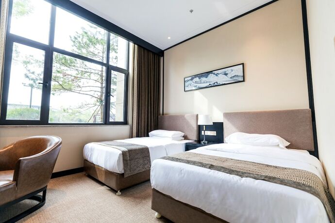 Imagen de la habitación del Hotel Huadi Resort. Foto 16