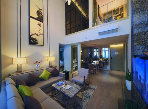Imagen de la habitación del Hotel Huafa Place. Foto 7