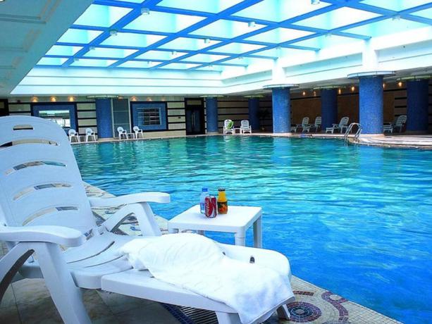 Imagen de la piscina del Hotel Huafang Jinling International Zhangjiagang. Foto 16