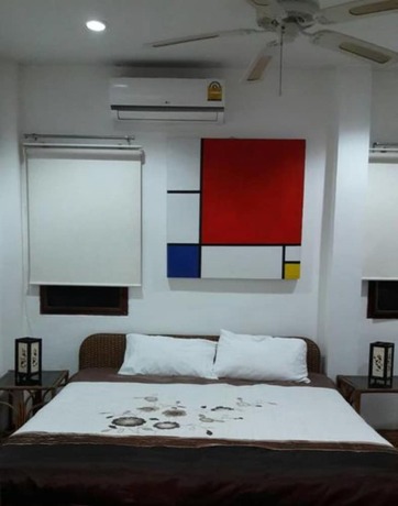 Imagen de la habitación del Hotel Huahin Cozy Villa. Foto 11