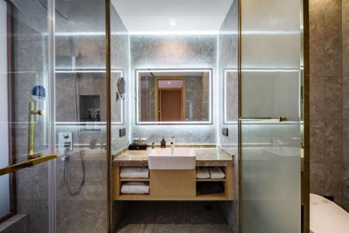 Imagen de la habitación del Hotel Huaian Reykana. Foto 13