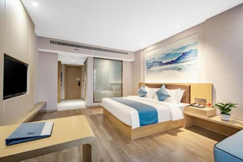 Imagen de la habitación del Hotel Huaian Reykana. Foto 17