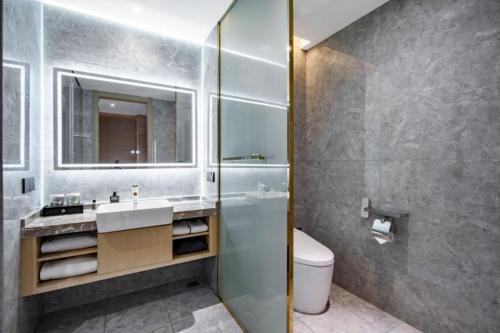 Imagen de la habitación del Hotel Huaian Reykana. Foto 19