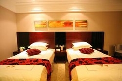 Imagen de la habitación del Hotel Huajing Grand Hotel. Foto 4