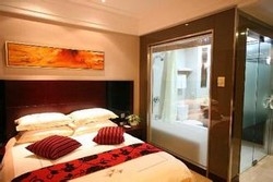 Imagen de la habitación del Hotel Huajing Grand Hotel. Foto 5