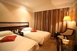 Imagen de la habitación del Hotel Huajing Grand Hotel. Foto 6