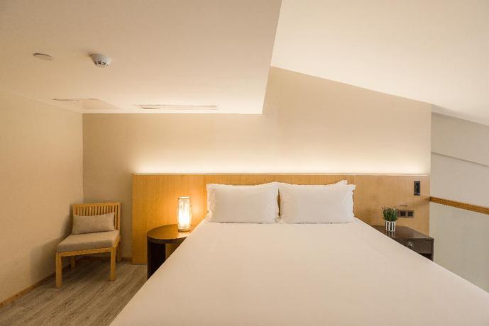 Imagen de la habitación del Hotel Huali Hotel (Hangzhou Xixi Wetland). Foto 11