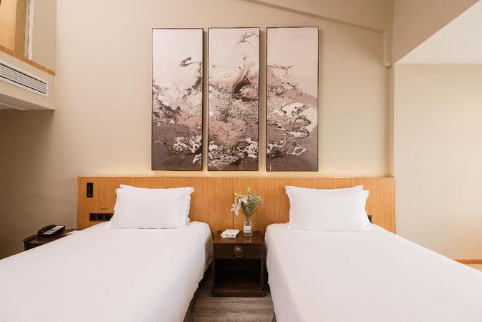 Imagen de la habitación del Hotel Huali Hotel (Hangzhou Xixi Wetland). Foto 12