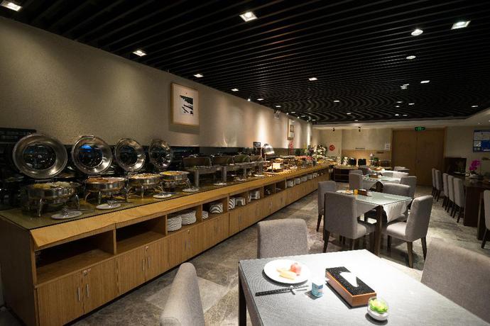 Imagen del bar/restaurante del Hotel Huali Hotel (Hangzhou Xixi Wetland). Foto 4