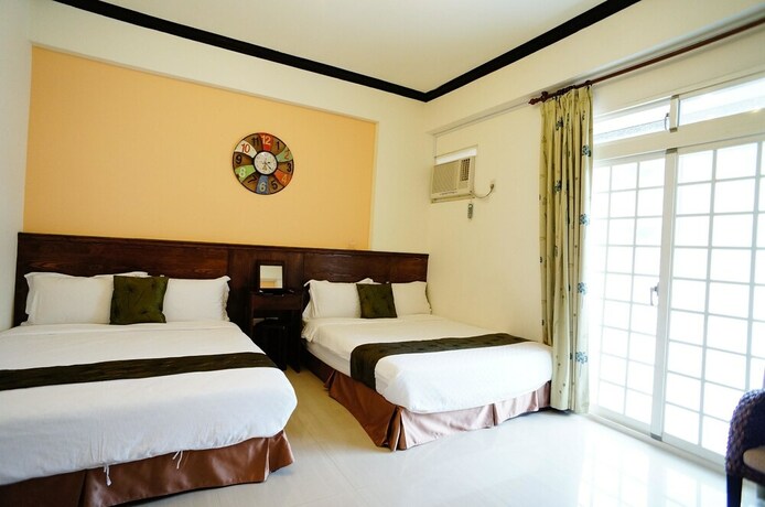 Imagen de la habitación del Hotel Hualien Yashe House. Foto 11