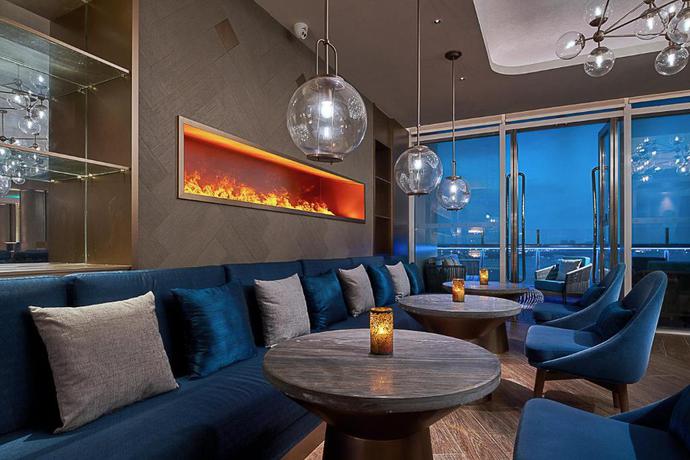 Imagen del bar/restaurante del Hotel Hualuxe Hotels and Resorts Haikou Seaview - IHG. Foto 8