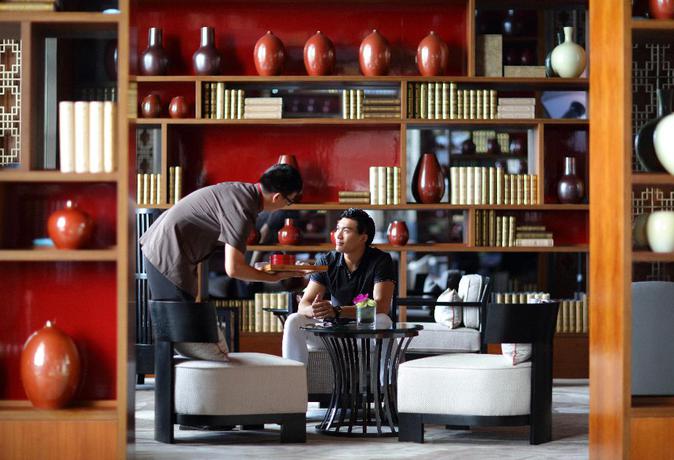 Imagen de los interiores del Hotel Hualuxe Hotels and Resorts Haikou Seaview - IHG. Foto 18
