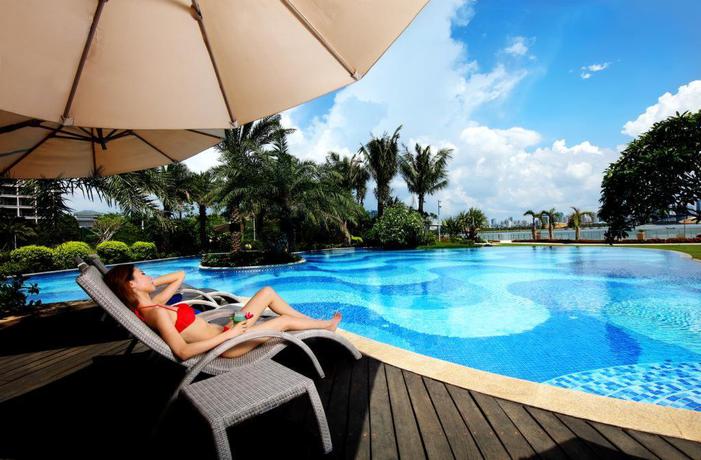 Imagen de la piscina del Hotel Hualuxe Hotels and Resorts Haikou Seaview - IHG. Foto 19