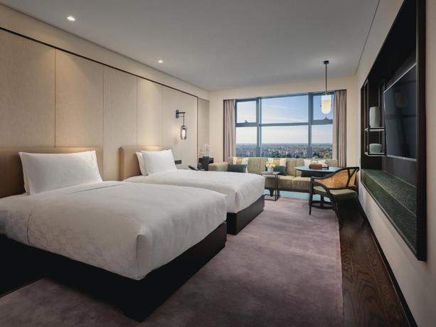 Imagen de la habitación del Hotel Hualuxe Kunshan Huaqiao, an IHG Hotel. Foto 8